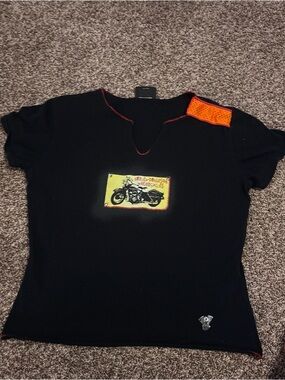 Rare 1980 Vintage Harley Davidson Tee with unique orange detail.